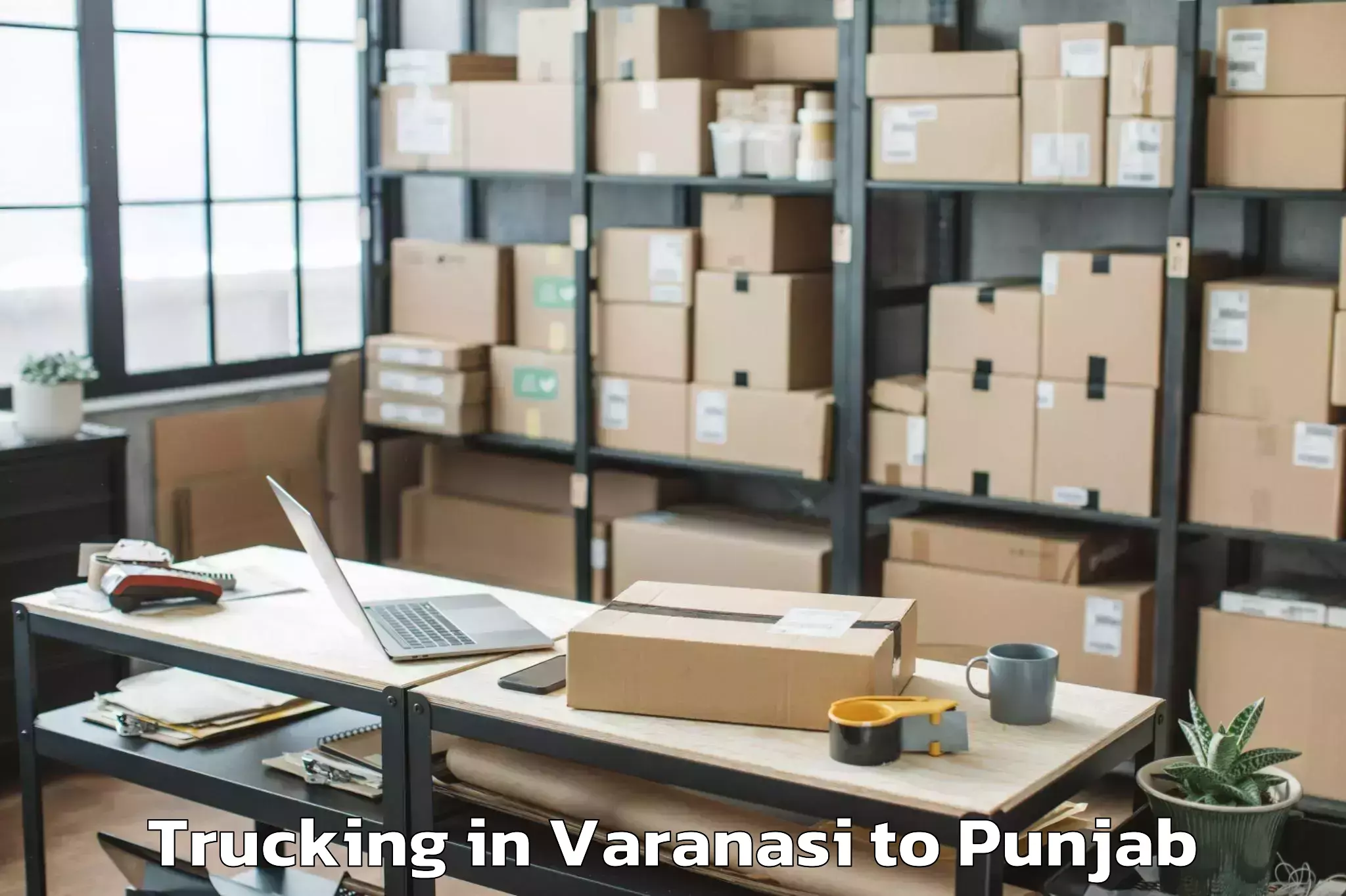 Trusted Varanasi to Sri Guru Ram Das University Of Trucking